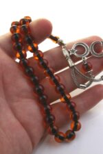 Toz Kehribar Tesbih Yuvarlak Küre İp Yolu Boyalı Sürmeli Kesim Kırmızı Renkli Metal Püsküllü